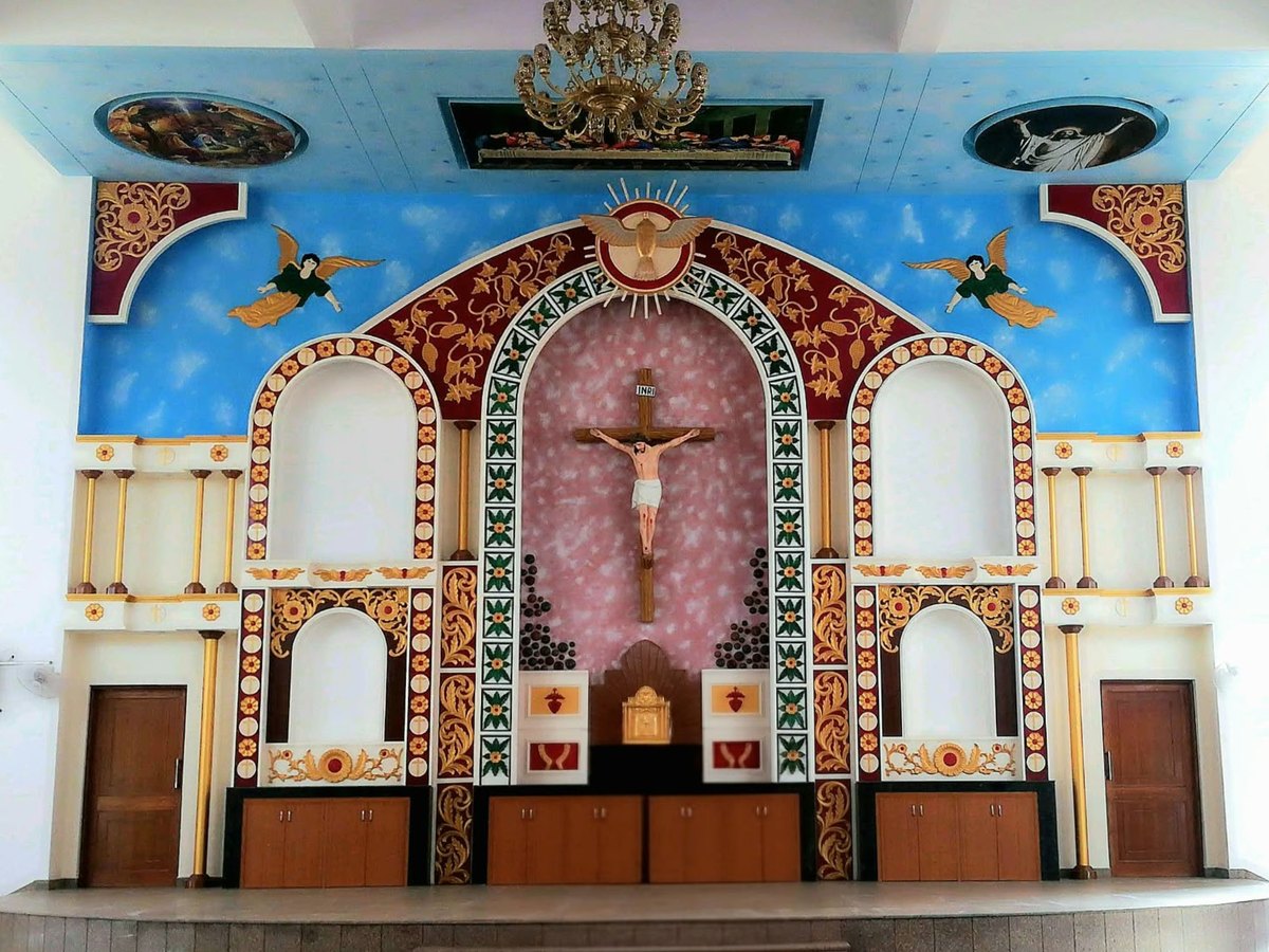 A church altar and sanctuary wall from one of Anju’s church projects at Trinity Architects